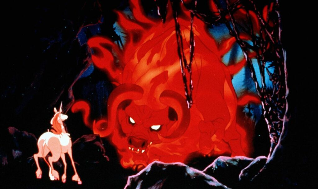 A pale unicorn stands alone facing a massive glowing red demon-like creature with curled horns in a dark, cavernous setting from an animated fantasy film